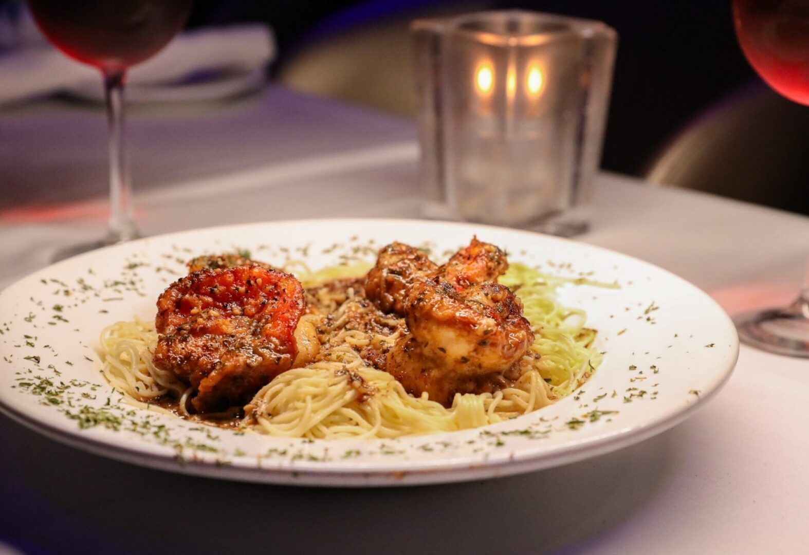 Pasta with grilled seafood and sauce