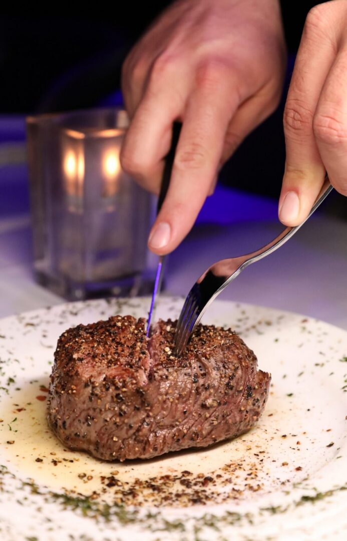 Juicy steak on a white plate